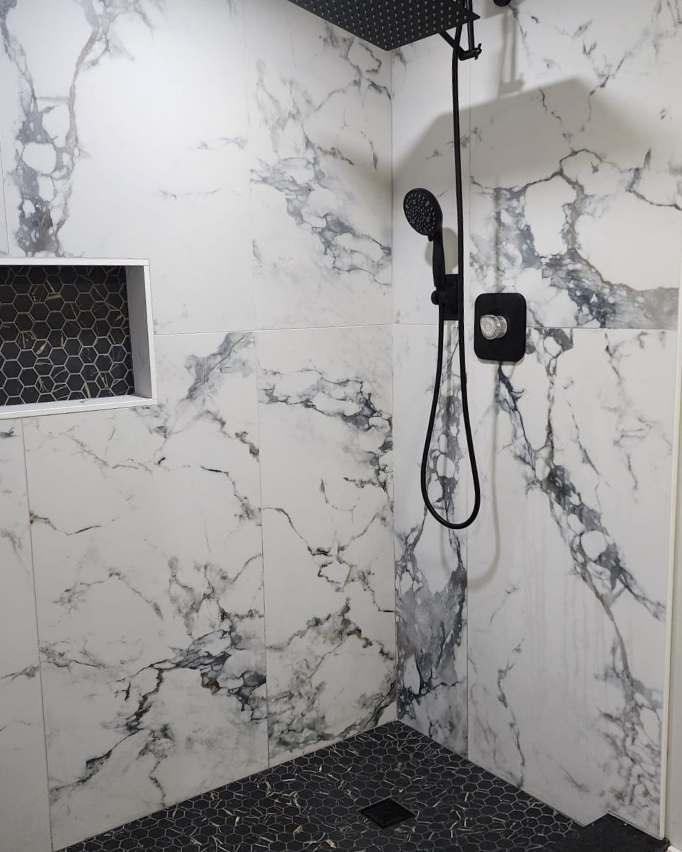 Bathroom finish work by FM Flooring Company Inc.