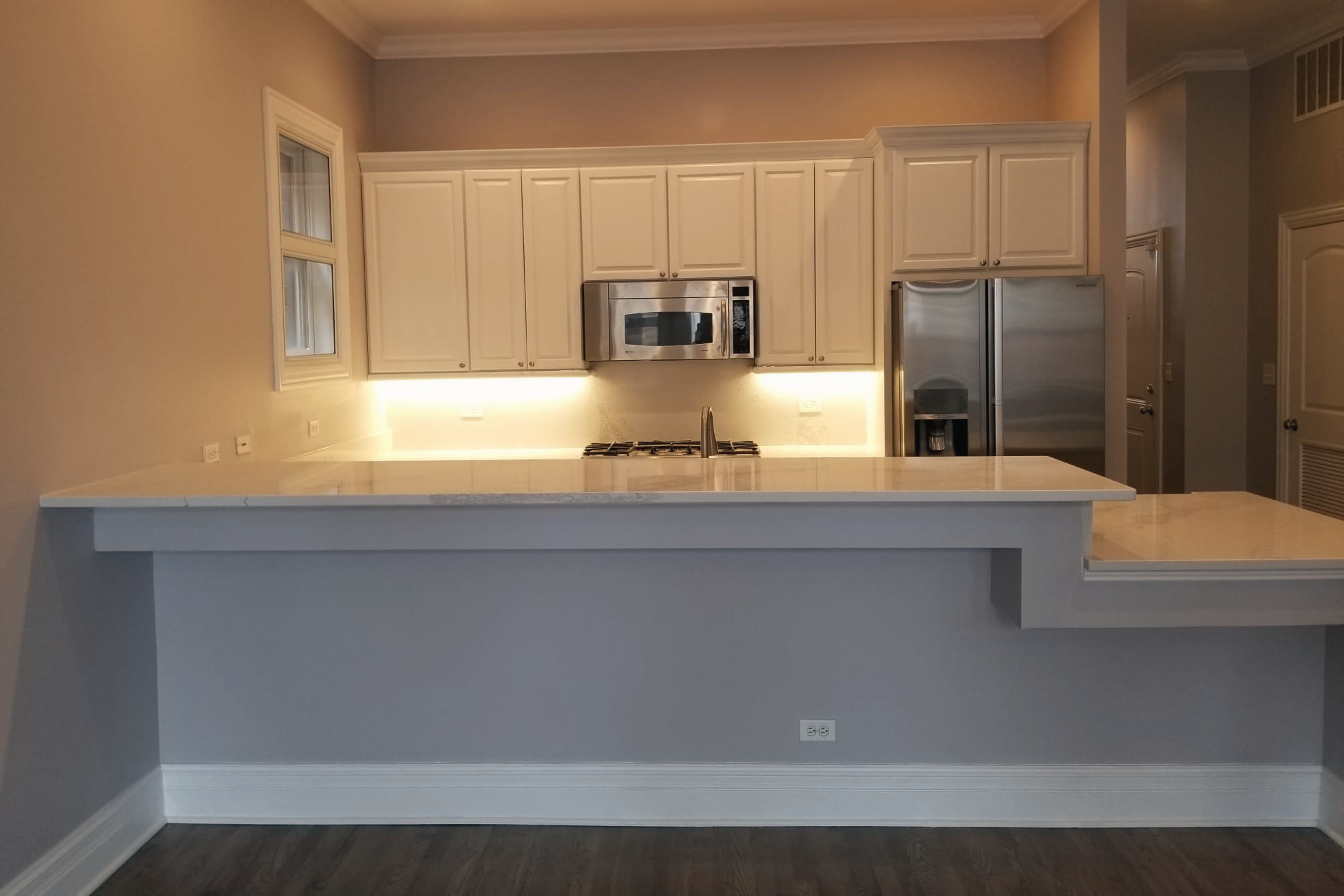 Kitchen remodeling and interior finish work by FM Flooring Company Inc.