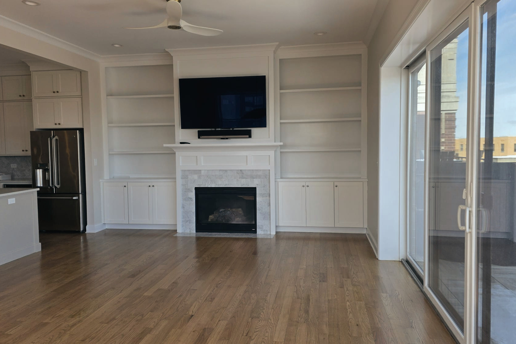 Living room remodeling project by FM Flooring Company Inc.